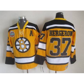Men's Boston Bruins #37 Patrice Bergeron 2009-10 Yellow CCM Vintage Throwback Jersey